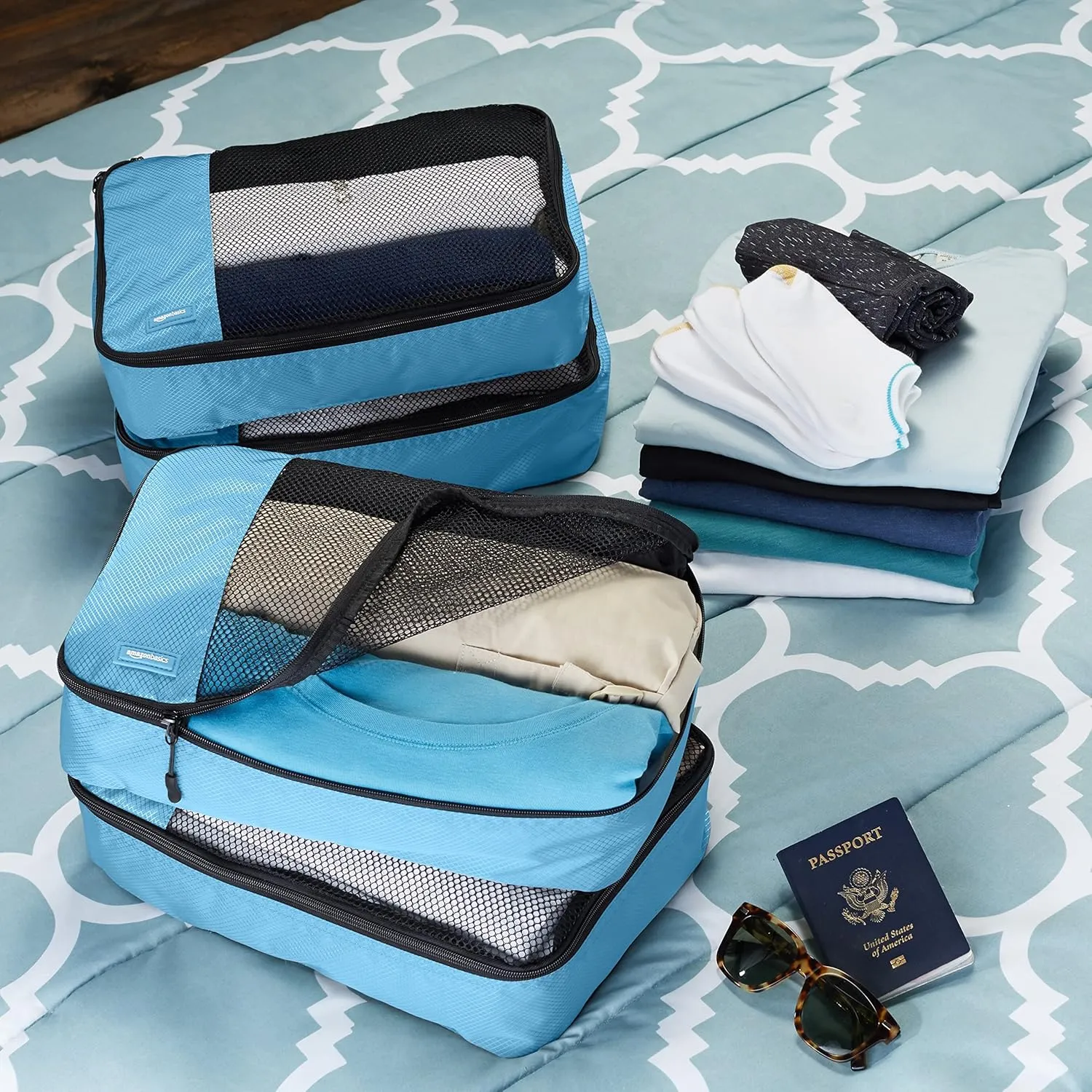 Amazon Basics Medium Packing Cubes for Travel, Packing Organizers, 4-Piece-Set With Double Zipper Pulls and Mesh Top Panel, 100% Durable Polyester, Sky Blue, 13.8"L x 9.8"W x 3"H