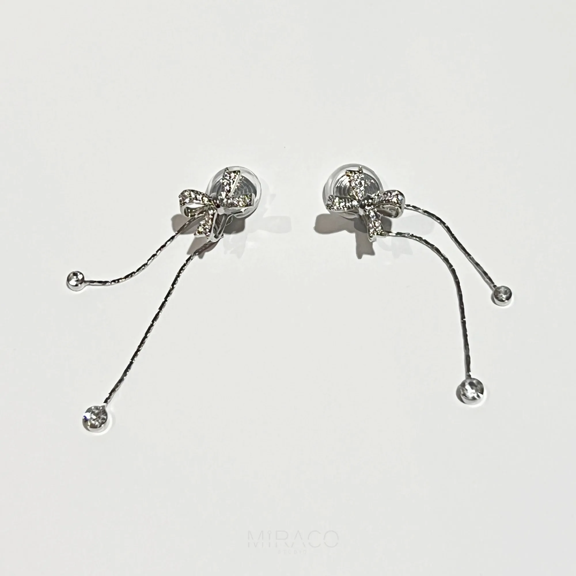 Bowknot Clip On Earrings with Tassel and Pave Diamonds